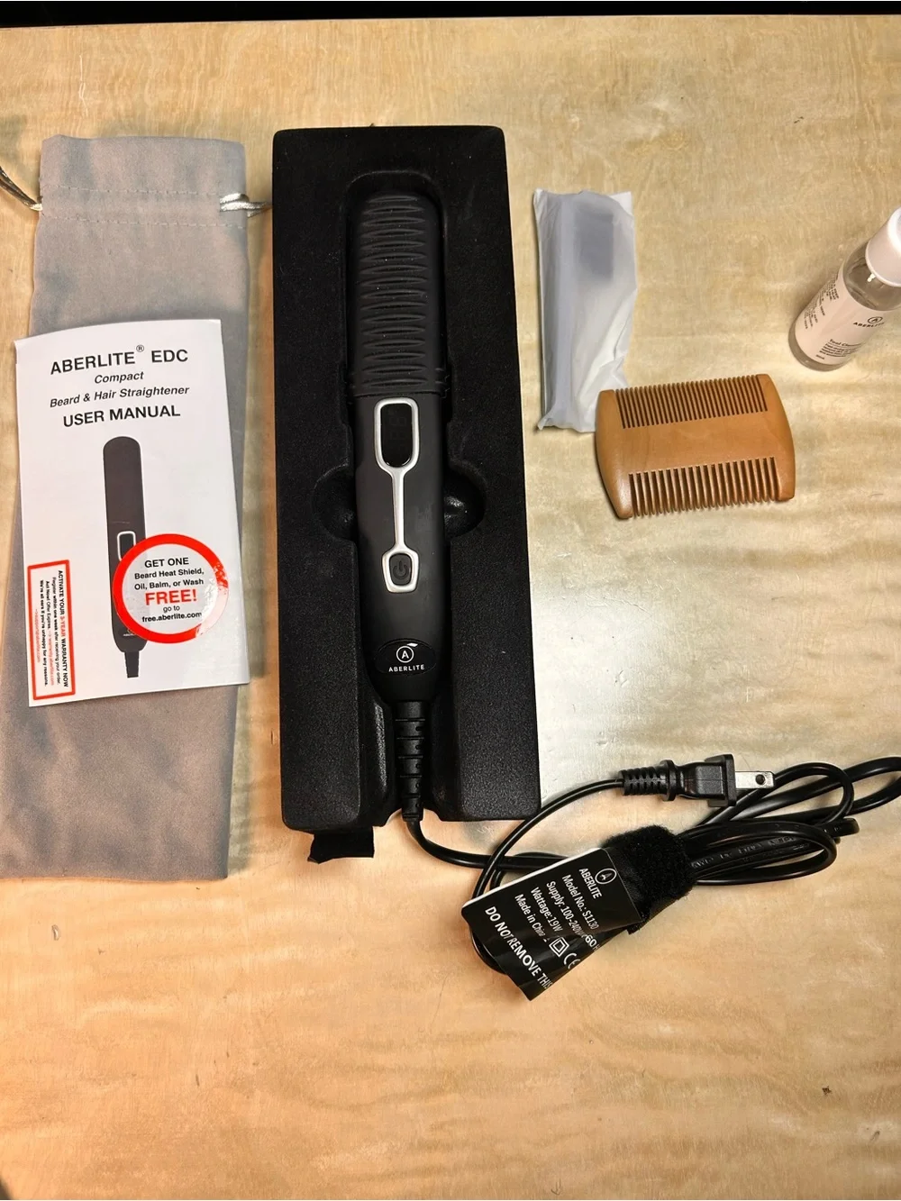 Aberlite edc beard and hair straightener.  Used once